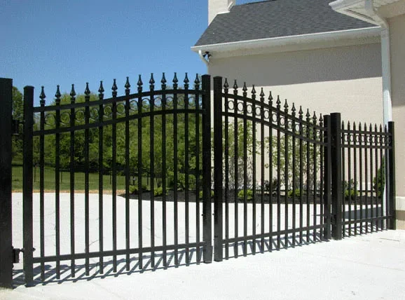 black aluminum estate gate installed at residential driveway with double swing design